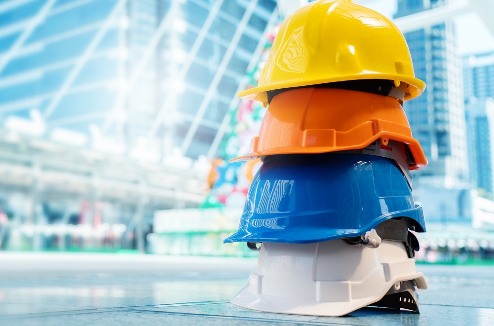 Four Builders Hats Stacked On Top Of Each Other Representing Different Roles Or "hats" Within Business