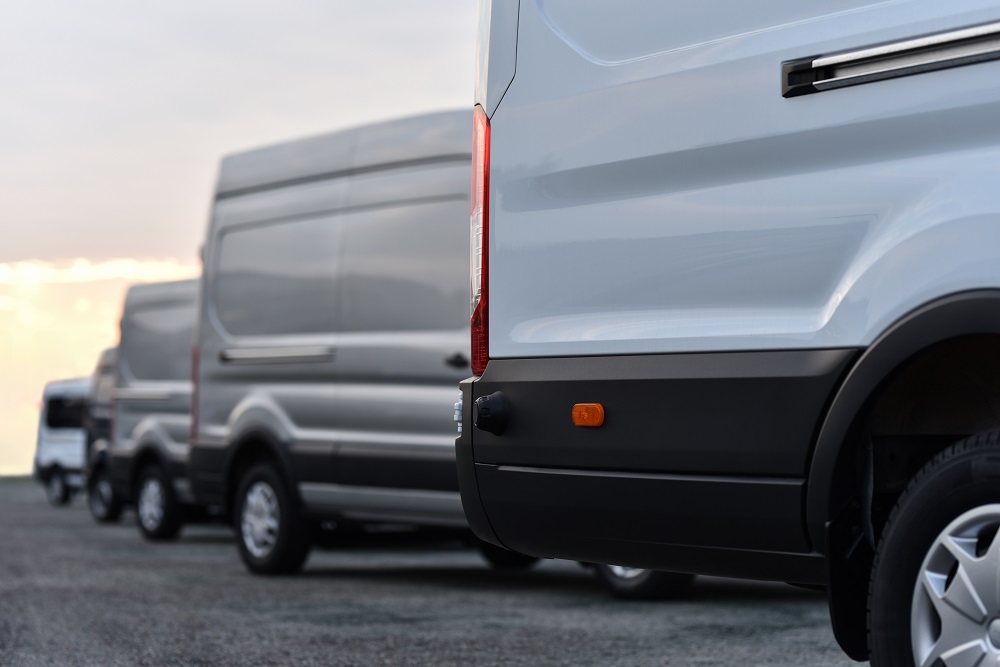 Row Of White Vans